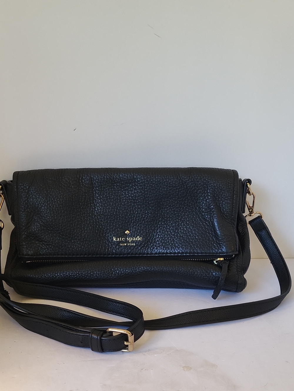 kate spade Black Pebbled Leather Fold-Over Crossbody with Bookstripe Lining